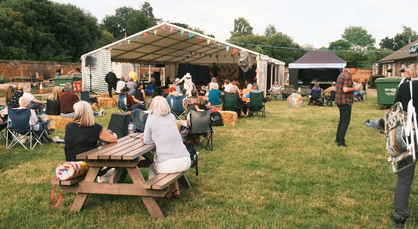 people enjoing a local music festival